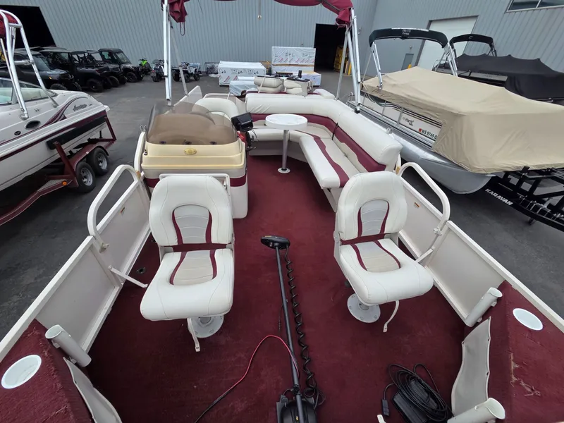 Slide: The Image of Interior view of a 2005 Starcraft STR20 pontoon boat. - 8