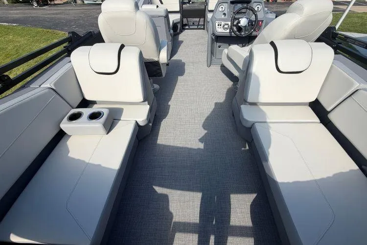 Slide: The Image of Luxurious interior of 2026 SunChaser Lucerne 22 LR DH Sport pontoon boat with plush seating. - 6