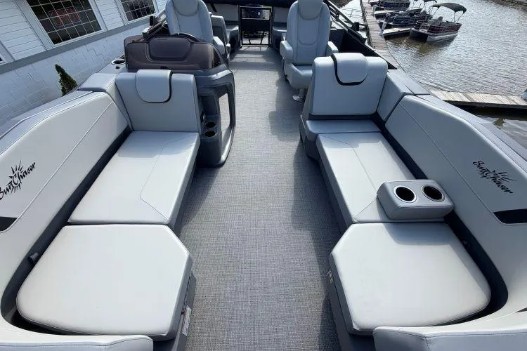 Slide: The Image of Luxurious interior of 2026 SunChaser Lucerne 22 LR DH Sport pontoon boat with plush seating. - 8