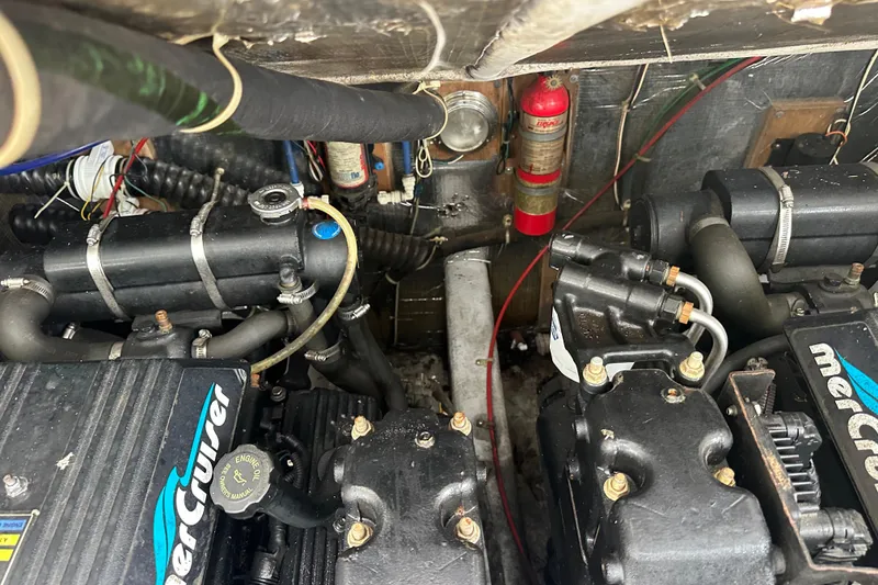 Slide: The Image of Engine compartment of a 2000 Albemarle 280 Express Fisherman boat with MerCruiser components. - 12