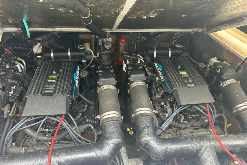 Slide: The Image of Engine compartment of a 2000 Albemarle 280 Express Fisherman with twin MerCruiser engines. - 10