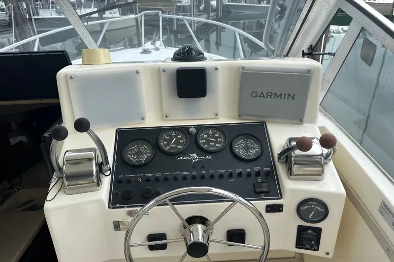 Slide: The Image of Control panel of a 2000 Albemarle 280 Express Fisherman with Garmin navigation system. - 13
