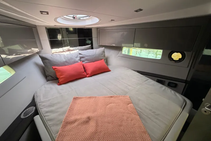 Slide: The Image of Luxurious cabin interior of 2023 Schaefer 400 yacht with cozy bedding and modern design. - 11