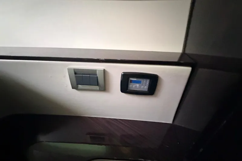 Slide: The Image of Control panel and switches on Schaefer 400 yacht, 2023 model interior. - 13