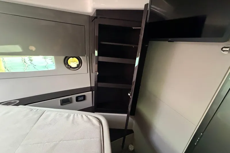 Slide: The Image of Interior of 2023 Schaefer 400 yacht, featuring sleek cabinetry and modern design elements. - 14