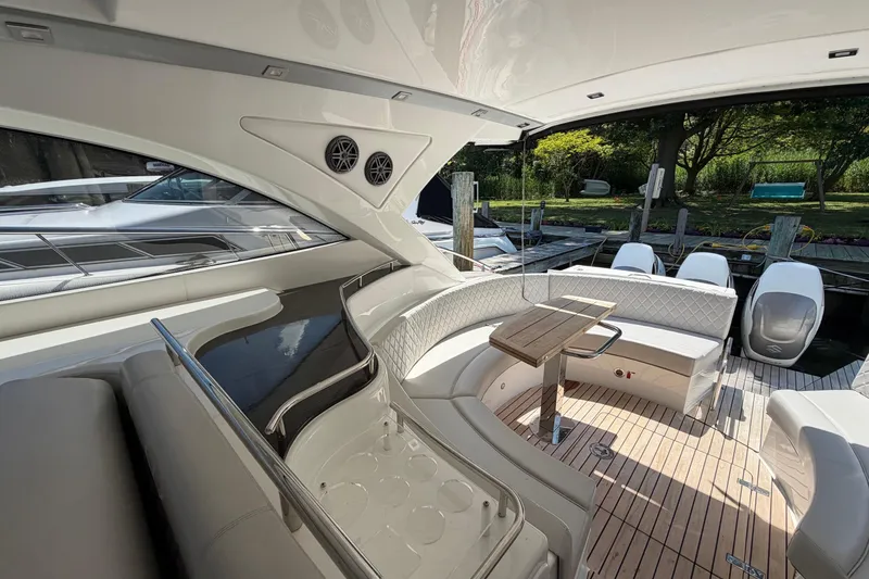 Slide: The Image of Luxurious 2023 Schaefer 400 yacht interior with elegant seating and wooden deck. - 25