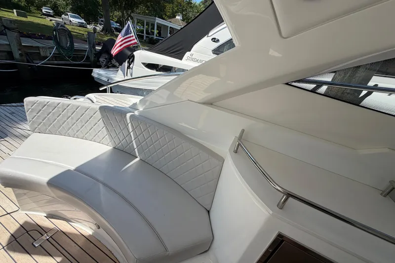 Slide: The Image of Luxurious seating on 2023 Schaefer 400 yacht with quilted upholstery and sleek design. - 29