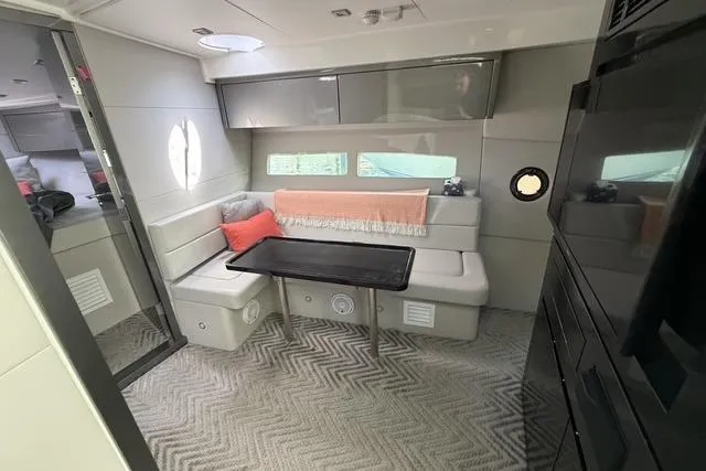 Slide: The Image of Modern interior of 2023 Schaefer 400 yacht with cozy seating and elegant design. - 7
