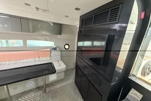 Slide: The Image of Modern interior of 2023 Schaefer 400 yacht with sleek design and comfortable seating. - 8