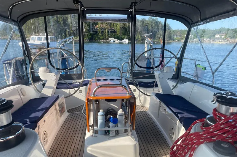 Slide: The Image of Interior view of 2006 Jeanneau Sun Odyssey 45 sailboat cockpit with dual steering wheels. - 8