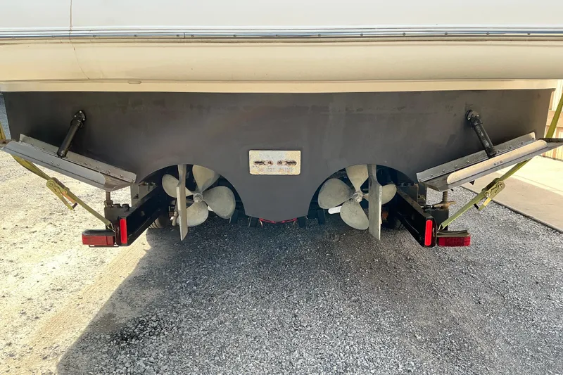 Slide: The Image of Rear view of 2005 Cruisers Yachts 370 Express with dual propellers and trim tabs. - 10