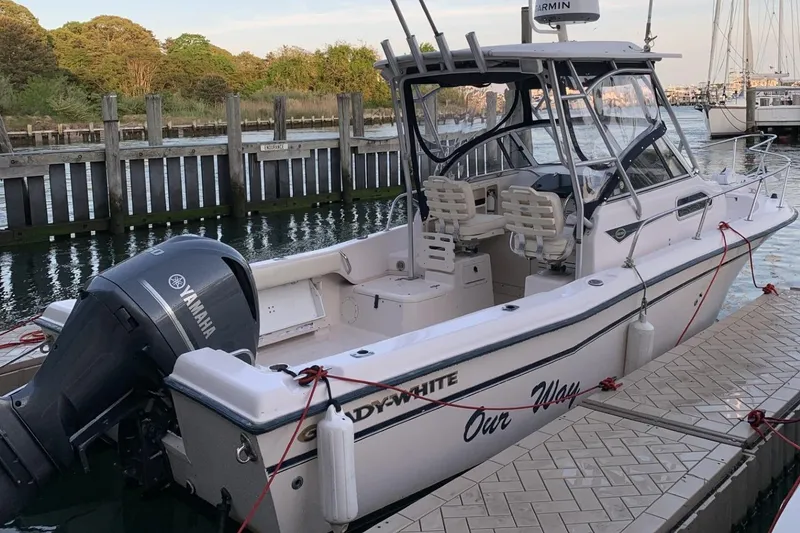 The Image of 2001 Grady-White Seafarer 226 boat docked, featuring Yamaha outboard motor. - 0