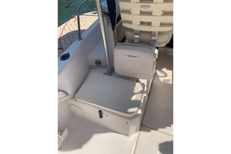 Slide: The Image of 2001 Grady-White Seafarer 226 boat interior with seating and storage compartments. - 12