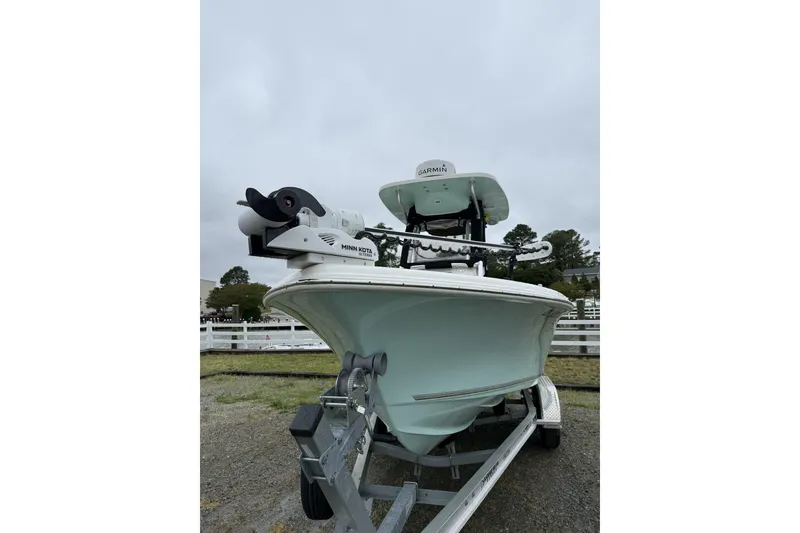 Slide: The Image of 2023 Key West 219 FS boat on trailer with Minn Kota and Garmin equipment. - 5