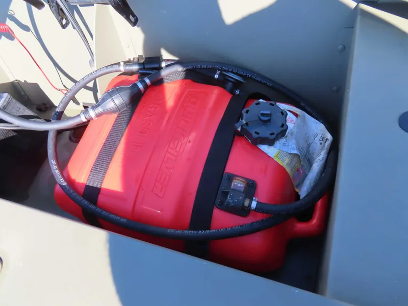 Slide: The Image of Red fuel tank in Tracker 1648 AWL boat, model 2024. - 15