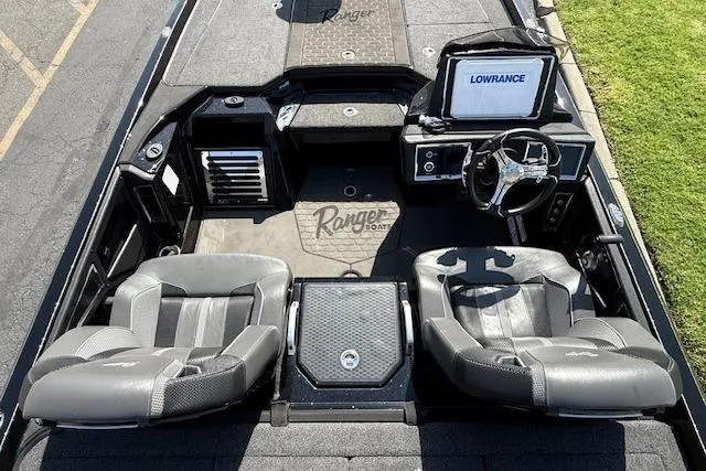 Slide: The Image of 2025 Ranger Z521R Cup-Equipped boat interior with dual seats and Lowrance navigation system. - 12