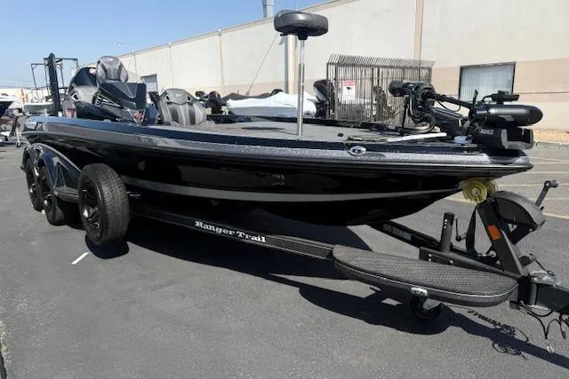 Slide: The Image of 2025 Ranger Z521R Cup-Equipped boat on trailer, parked outdoors. - 7