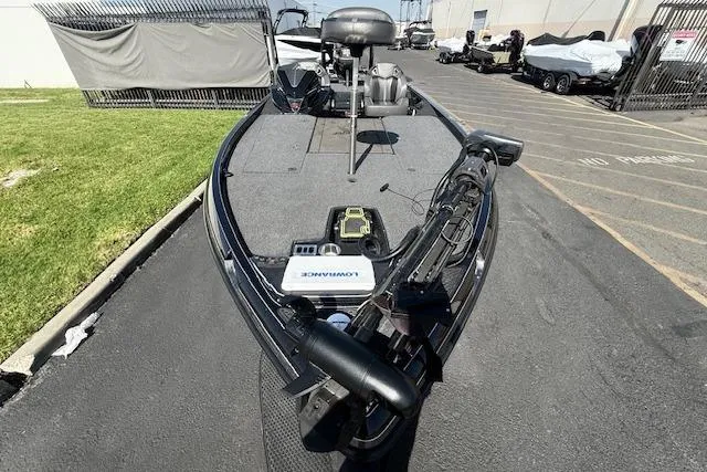 Slide: The Image of 2025 Ranger Z521R Cup-Equipped boat with advanced navigation system, parked outdoors. - 8