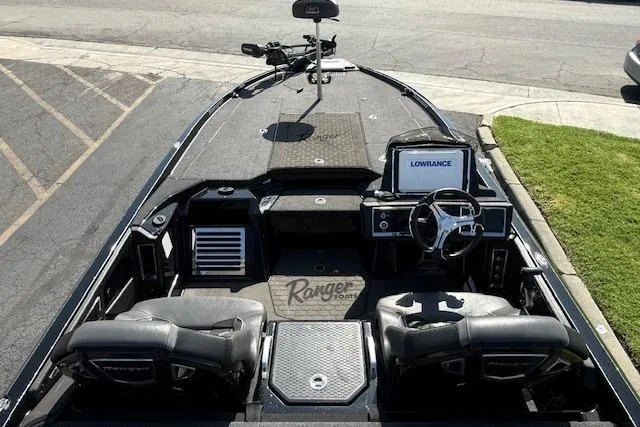 Slide: The Image of 2025 Ranger Z521R Cup-Equipped boat interior with advanced navigation system and dual seating. - 9