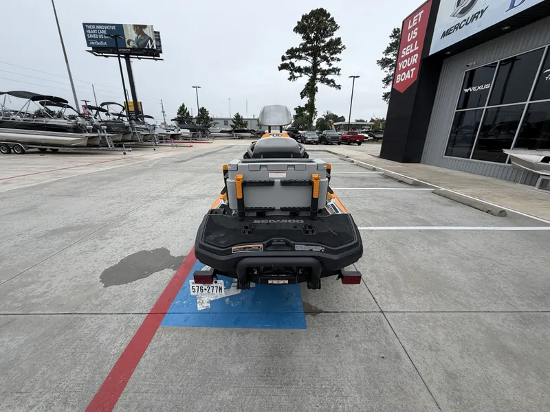 Slide: The Image of 2022 Sea-Doo FISH PRO TROPHY 170 parked outside boat dealership. - 9