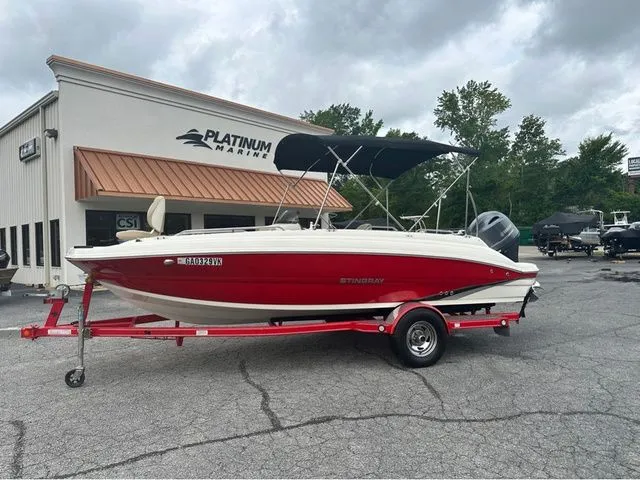 The Image of 2016 Stingray 192 SC boat in front of Platinum Marine building. - 1