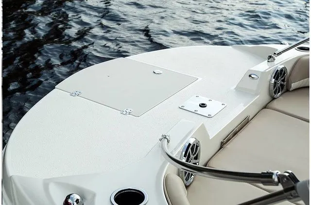 Slide: The Image of 2016 Stingray 192 SC boat with seating area and water view. - 14