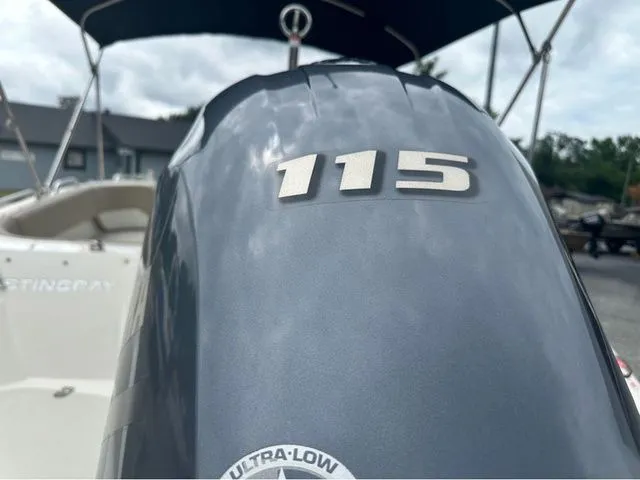 Slide: The Image of Close-up of a 2016 Stingray 192 SC boat with 115 HP engine. - 5