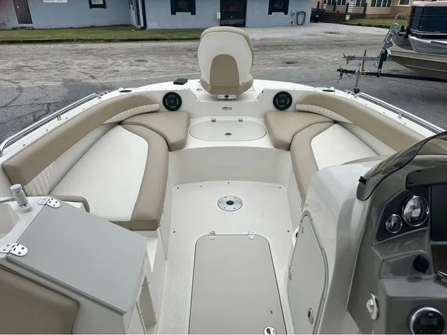 Slide: The Image of Interior of a 2016 Stingray 192 SC boat with seating area. - 9