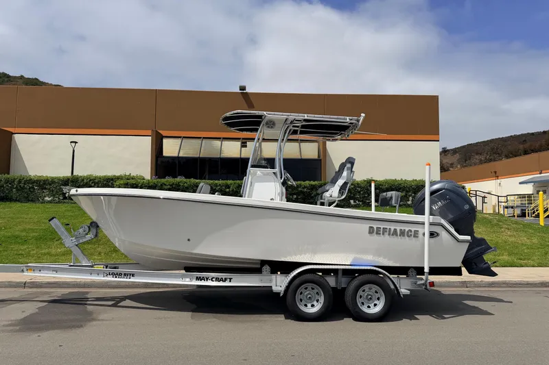 The Image of 2026 Defiance Catalina 210 boat on trailer, parked outdoors, side view. - 1