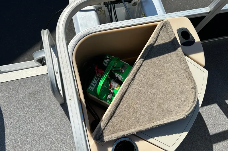 Slide: The Image of Storage compartment on a 2017 Sun Tracker Bass Buggy 18 DLX pontoon boat. - 16