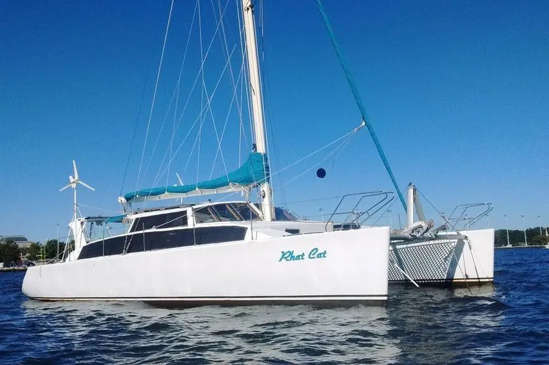 The Image of Custom Leopard Morrelli & Melvin 46 catamaran, 2003 model, sailing on a clear blue day. - 0