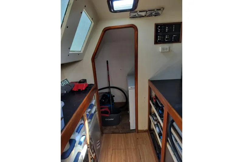Slide: The Image of Interior of 2003 Custom Leopard Morrelli & Melvin 46 yacht, featuring storage and equipment. - 10