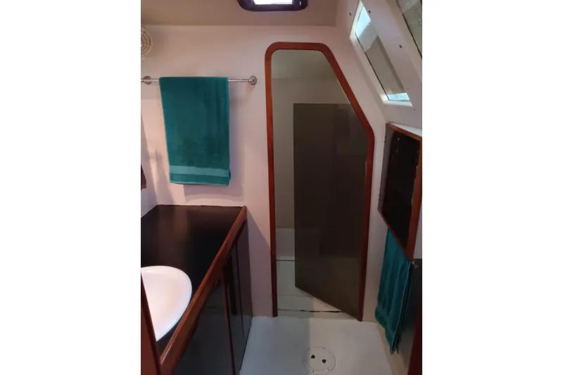 Slide: The Image of Bathroom interior of 2003 Custom Leopard Morrelli & Melvin 46 yacht, featuring modern fixtures. - 26