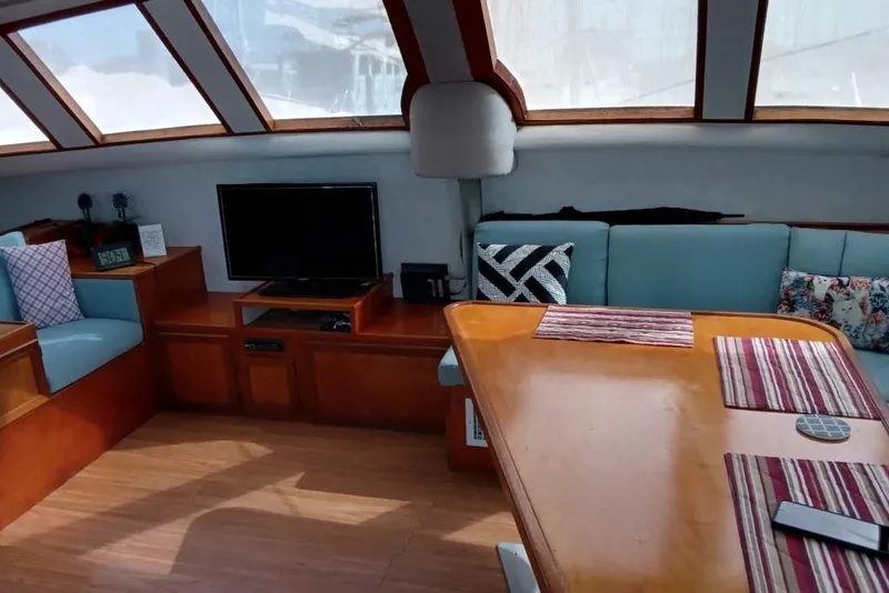 Slide: The Image of Interior of 2003 Custom Leopard Morrelli & Melvin 46 yacht with cozy seating and TV. - 27