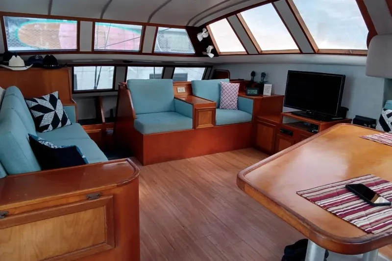 Slide: The Image of Luxurious interior of 2003 Custom Leopard Morrelli & Melvin 46 yacht with seating and entertainment area. - 29