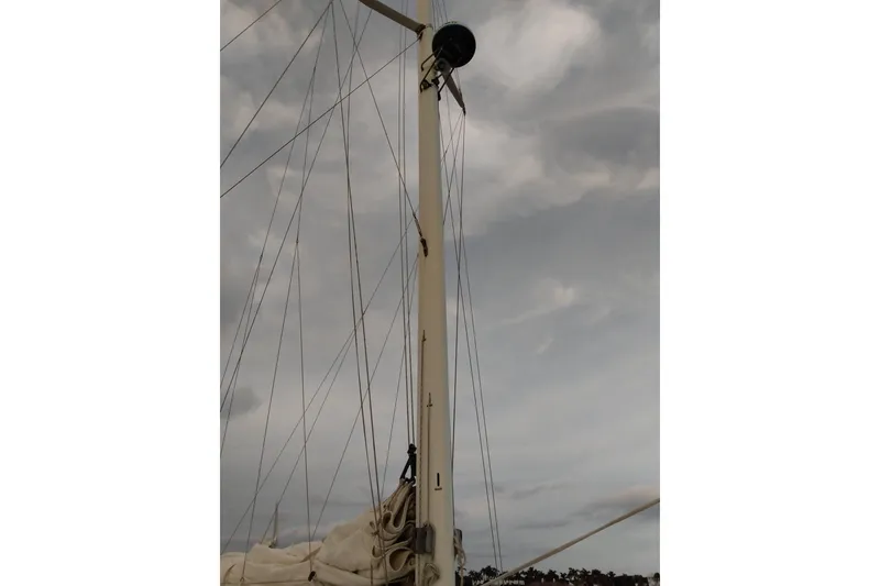 Slide: The Image of Mast and rigging of 2003 Custom Leopard Morrelli & Melvin 46 sailboat against cloudy sky. - 8