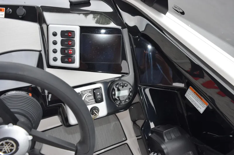 Slide: The Image of 2026 Yamaha Boats AR220 dashboard with steering wheel and control panel. - 20