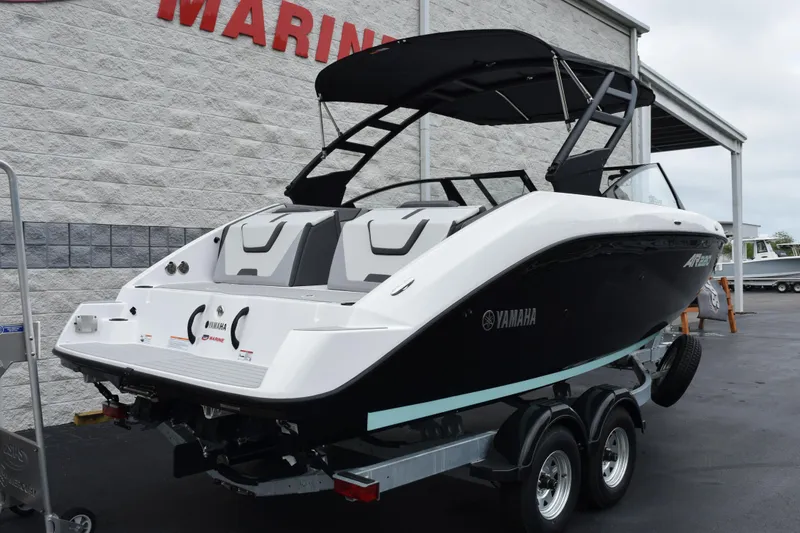 Slide: The Image of 2026 Yamaha Boats AR220 on trailer, sleek design, black and white color scheme. - 4