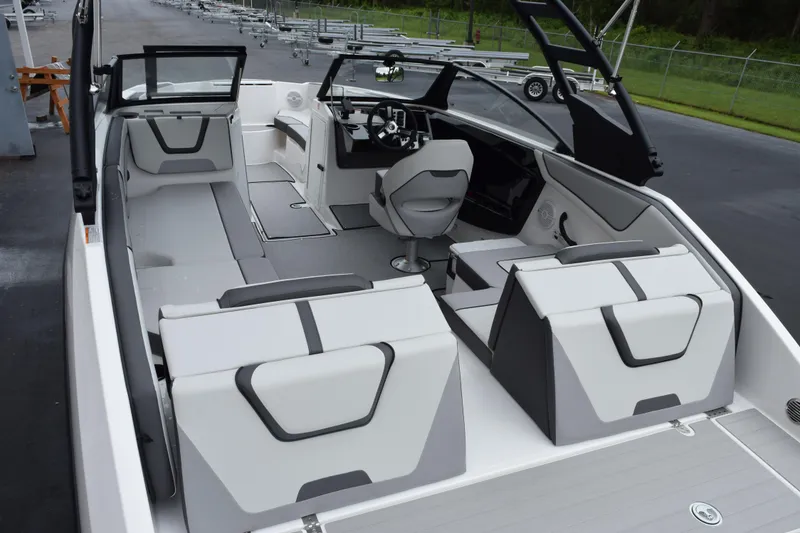 Slide: The Image of 2026 Yamaha Boats AR220 interior with modern seating and sleek design. - 7