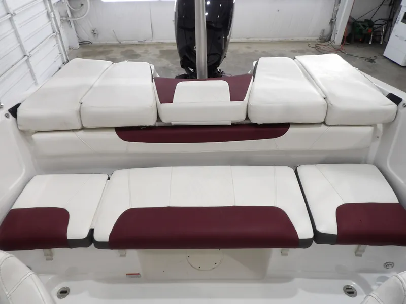 Slide: The Image of Interior view of a 2022 Tahoe 185 boat with white and red seating. - 17