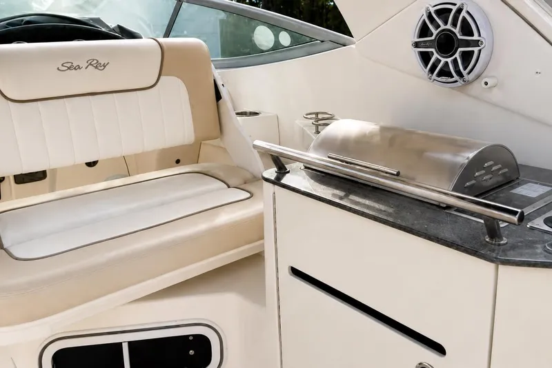 Slide: The Image of Luxurious interior of 2012 Sea Ray Sundancer 310 with seating and grill. - 9
