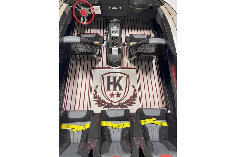 Slide: The Image of Interior of 2025 HellCat 32 Widebody boat with luxury seating and Garmin navigation. - 12
