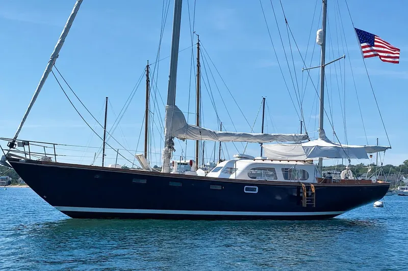 The Image of 1965 Pearson Countess 44 sailboat on calm water. - 0