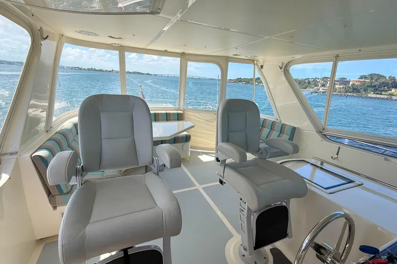 Slide: The Image of Luxurious interior of 2018 Marlow 53E yacht with ocean view and comfortable seating. - 29