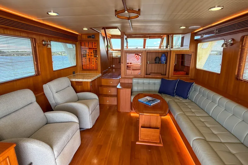 Slide: The Image of Luxurious interior of 2018 Marlow 53E yacht with plush seating and elegant wood finishes. - 44