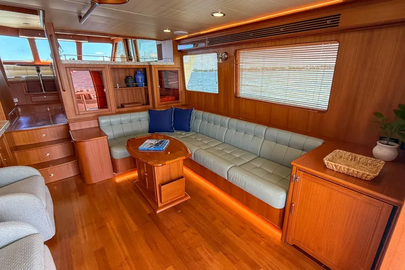 Slide: The Image of Luxurious interior of 2018 Marlow 53E yacht with elegant wood finishes and comfortable seating. - 45