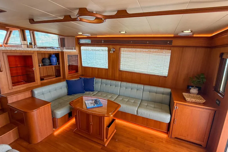 Slide: The Image of Luxurious interior of 2018 Marlow 53E yacht with elegant wood finish and cozy seating. - 50
