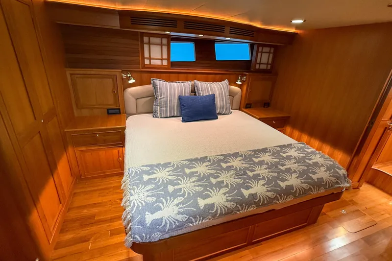 Slide: The Image of Luxurious cabin interior of 2018 Marlow 53E yacht with elegant wood finish. - 71