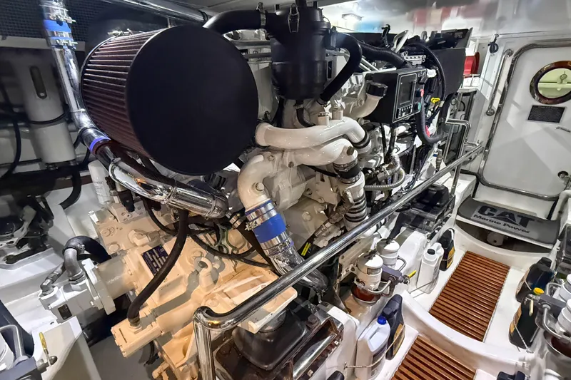 Slide: The Image of Engine room of 2018 Marlow 53E yacht, featuring advanced marine power systems. - 85