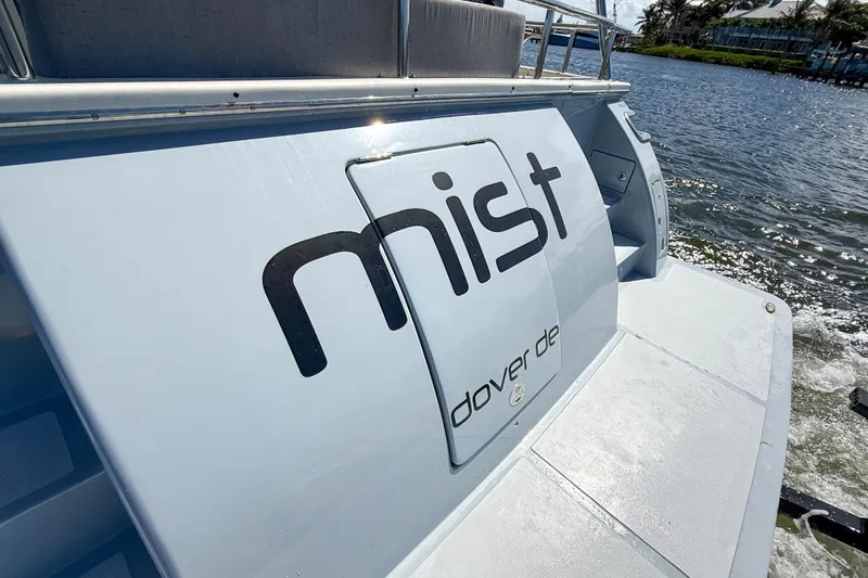 Slide: The Image of Stern view of 2018 Marlow 53E yacht "Mist" on water, Dover DE. - 92